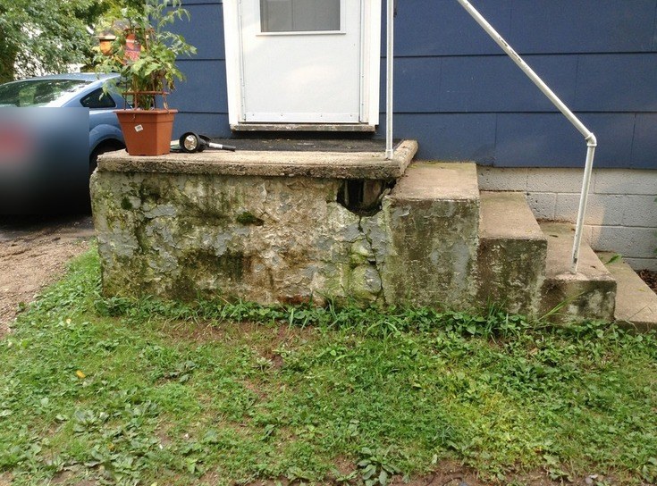 Before: mossy, worn concrete stoop ahead of resurfacing