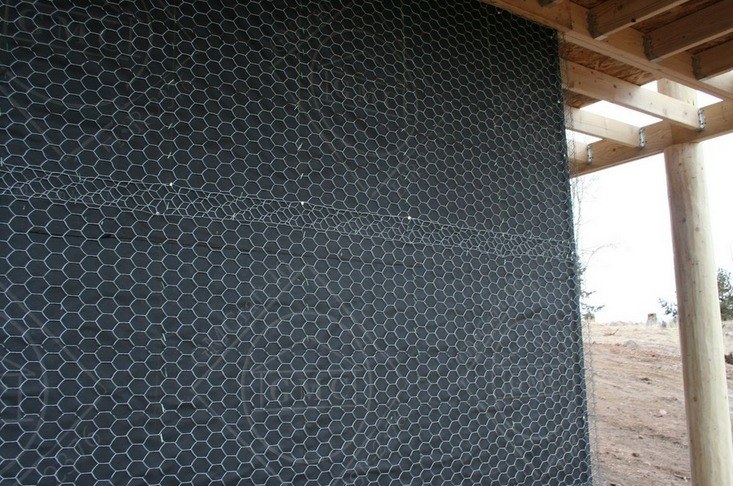 Wire lath fastened to a wall before stucco is applied